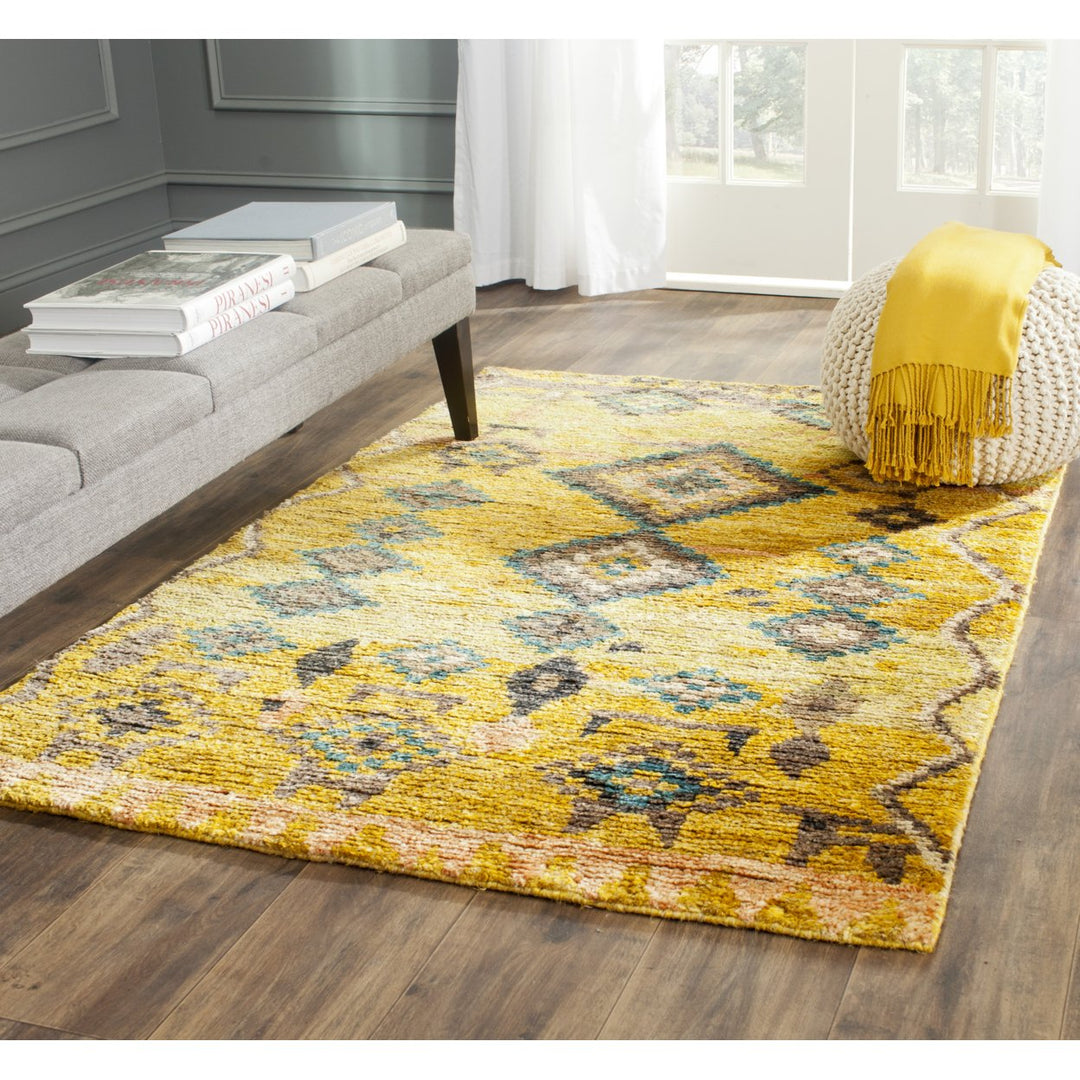 SAFAVIEH Tangier Collection TGR652A Hand-knotted Gold Rug Image 1