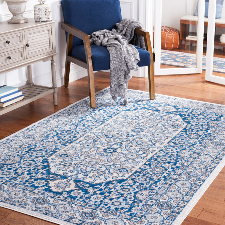SAFAVIEH Toscana Collection TOS652B Ivory / Navy Rug Image 1