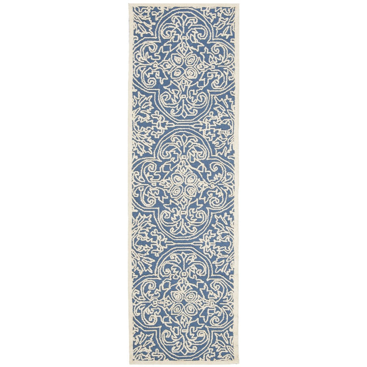 SAFAVIEH Trace TRC101B Handmade Blue / Ivory Rug Image 1