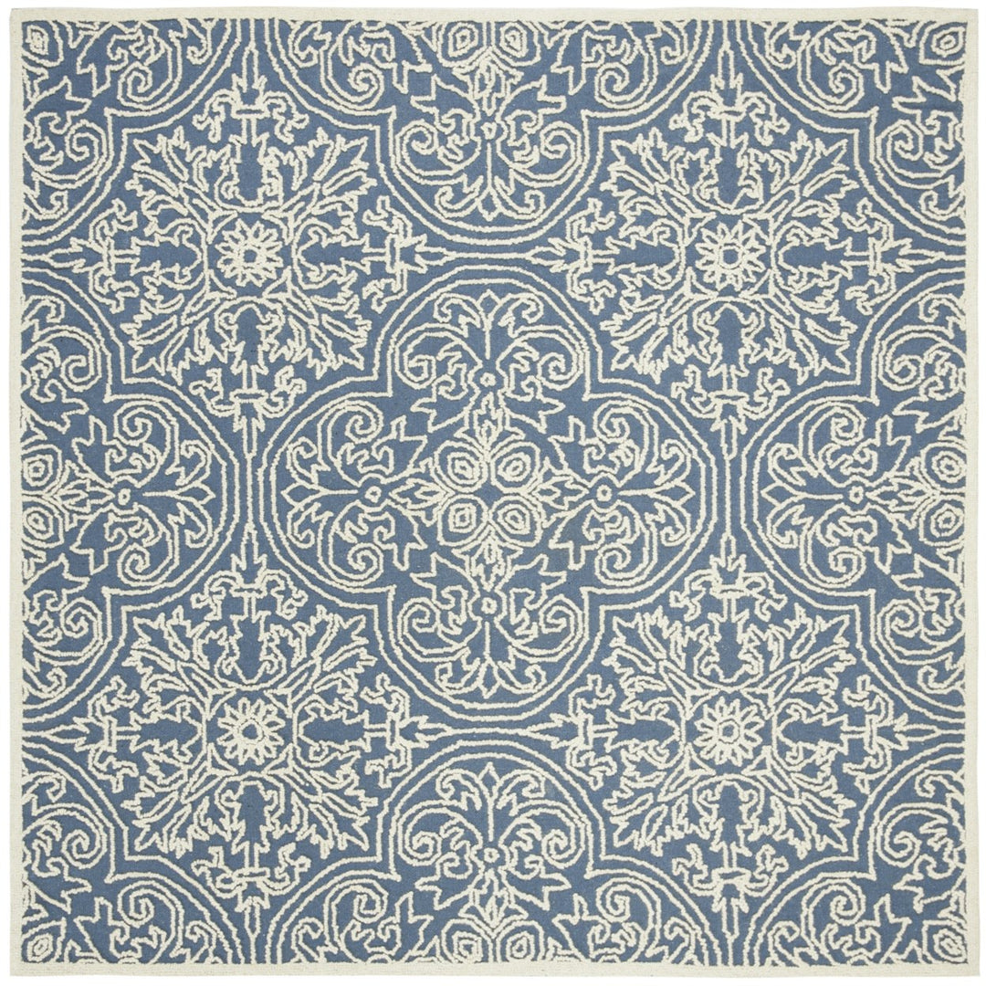 SAFAVIEH Trace TRC101B Handmade Blue / Ivory Rug Image 1