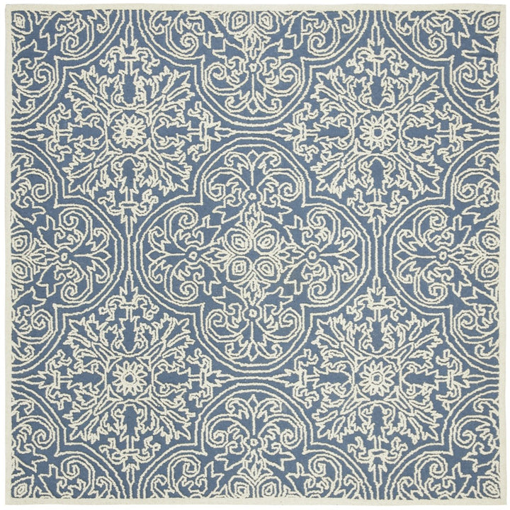 SAFAVIEH Trace TRC101B Handmade Blue / Ivory Rug Image 1