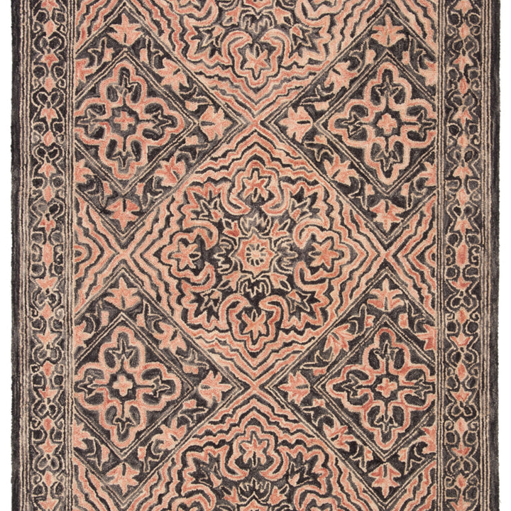 SAFAVIEH Trace Collection TRC507Z Handmade Black/Red Rug Image 1