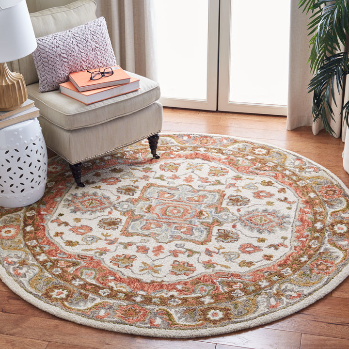 SAFAVIEH Trace Collection TRC523A Handmade Ivory/Red Rug Image 2