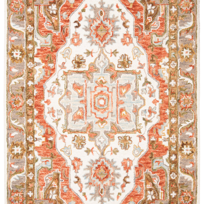 SAFAVIEH Trace Collection TRC523A Handmade Ivory/Red Rug Image 1