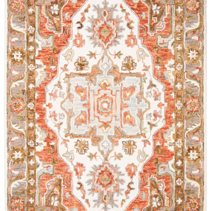 SAFAVIEH Trace Collection TRC523A Handmade Ivory/Red Rug Image 1