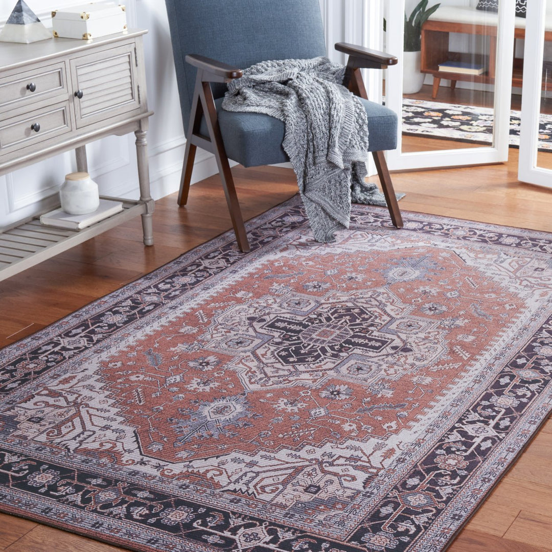 SAFAVIEH Tucson Collection TSN128P Rust / Navy Rug Image 1