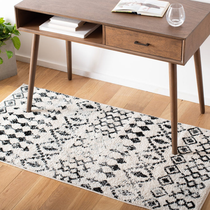 SAFAVIEH Tulum Collection TUL240B Ivory / Black Rug Image 1