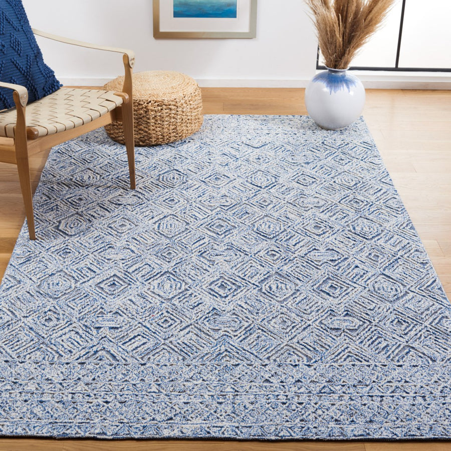 SAFAVIEH Textual TXT201M Handmade Blue / Ivory Rug Image 1