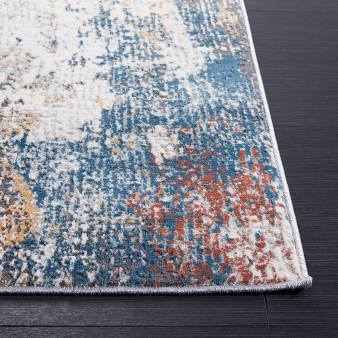 SAFAVIEH Vogue Collection VGE206A Ivory / Blue Rust Rug Image 3