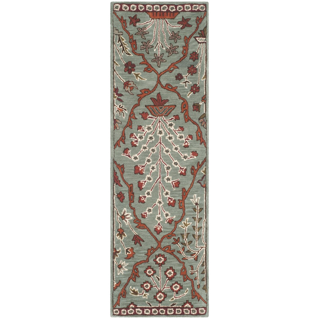 SAFAVIEH Wyndham WYD206A Handmade Blue / Rust Rug Image 1