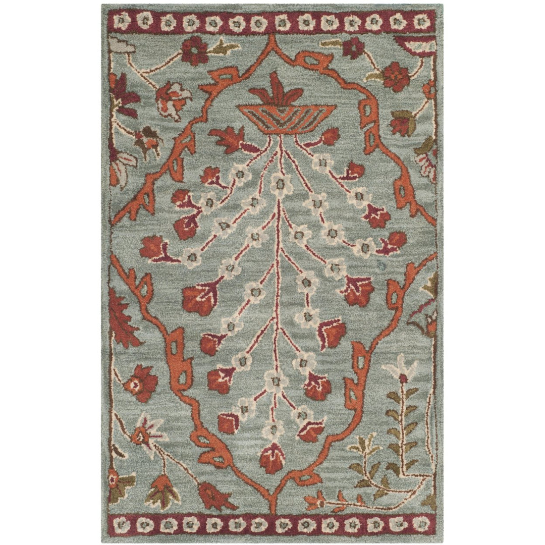 SAFAVIEH Wyndham WYD206A Handmade Blue / Rust Rug Image 1