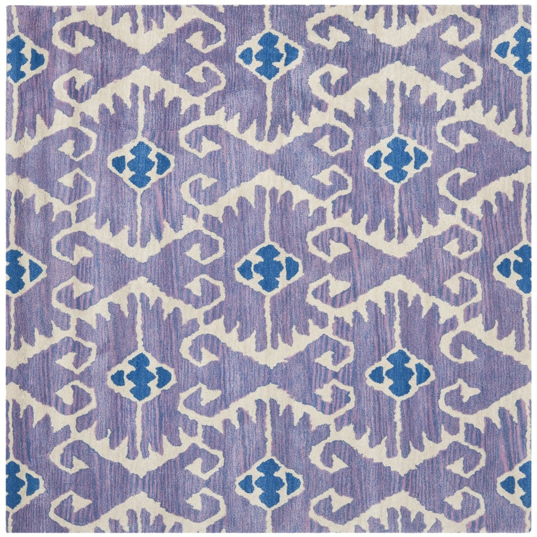 SAFAVIEH Wyndham WYD323A Handmade Lavender / Ivory Rug Image 1