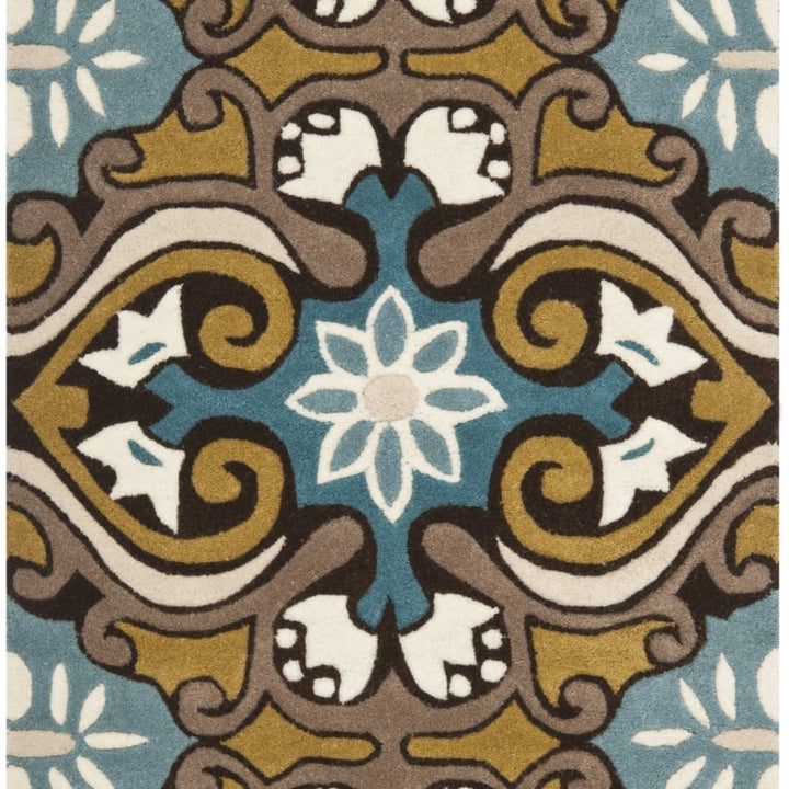 SAFAVIEH Wyndham WYD327A Handmade Blue / Multi Rug Image 1