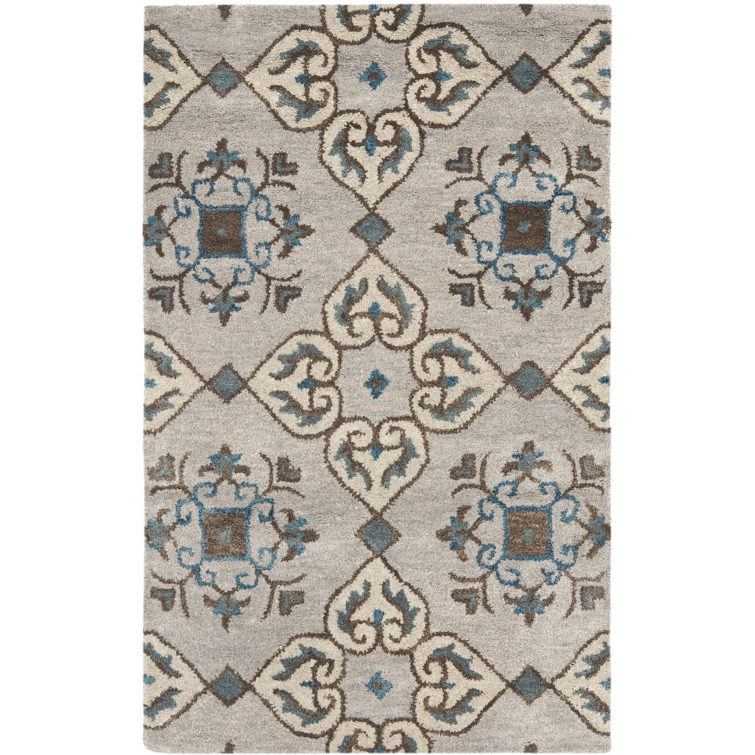 SAFAVIEH Wyndham WYD617A Handmade Beige / Multi Rug Image 1