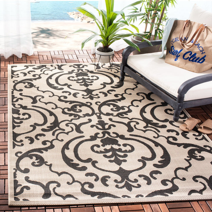 SAFAVIEH Indoor Outdoor CY2663-3901 Courtyard Sand / Black Rug Image 1