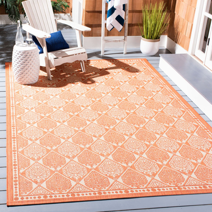 SAFAVIEH Outdoor CY5149A Courtyard Collection Rust / Sand Rug Image 1