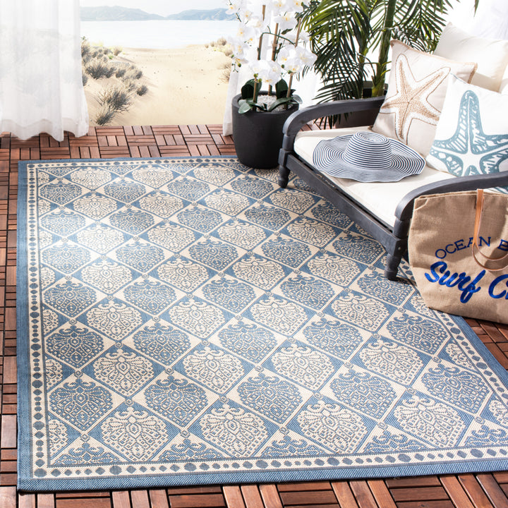 SAFAVIEH Indoor Outdoor CY5149C Courtyard Blue / Ivory Rug Image 1