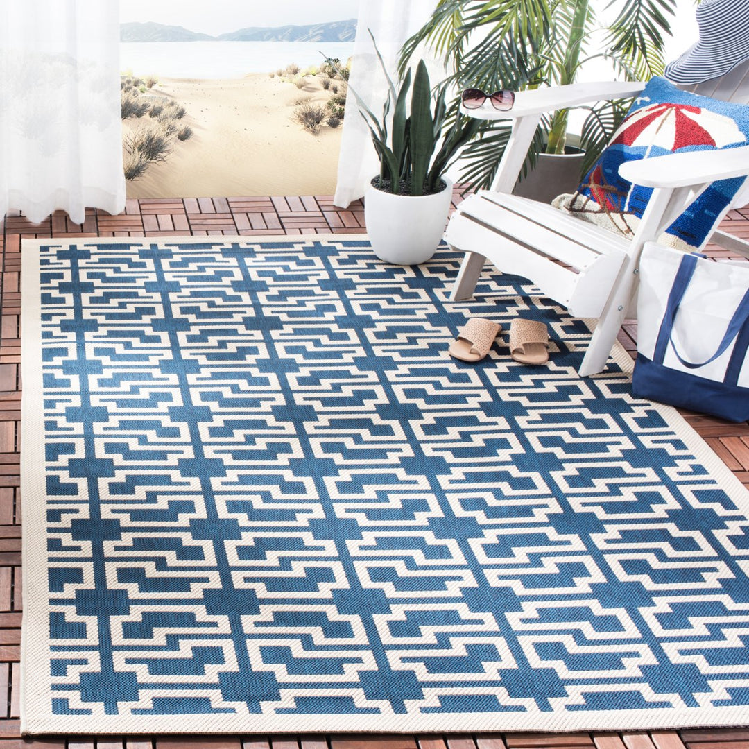 SAFAVIEH Indoor Outdoor CY6015-268 Courtyard Navy / Beige Rug Image 1