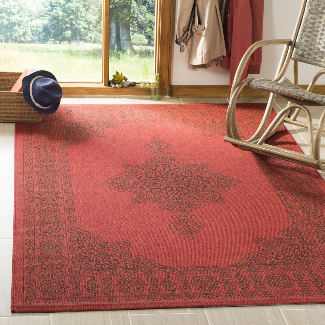 SAFAVIEH Outdoor CY6232-303 Courtyard Red / Chocolate Rug Image 1