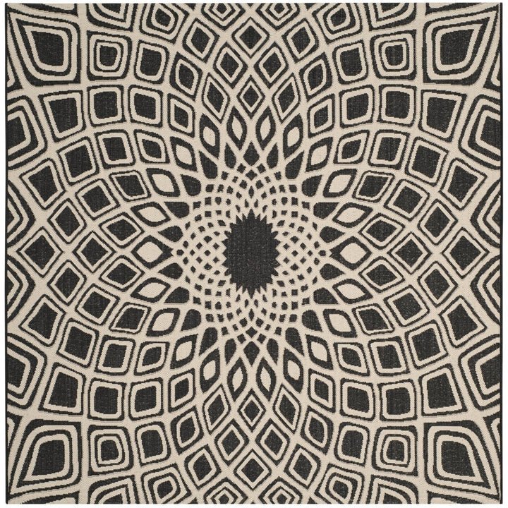 SAFAVIEH Outdoor CY6616-25621 Courtyard Black / Beige Rug Image 1