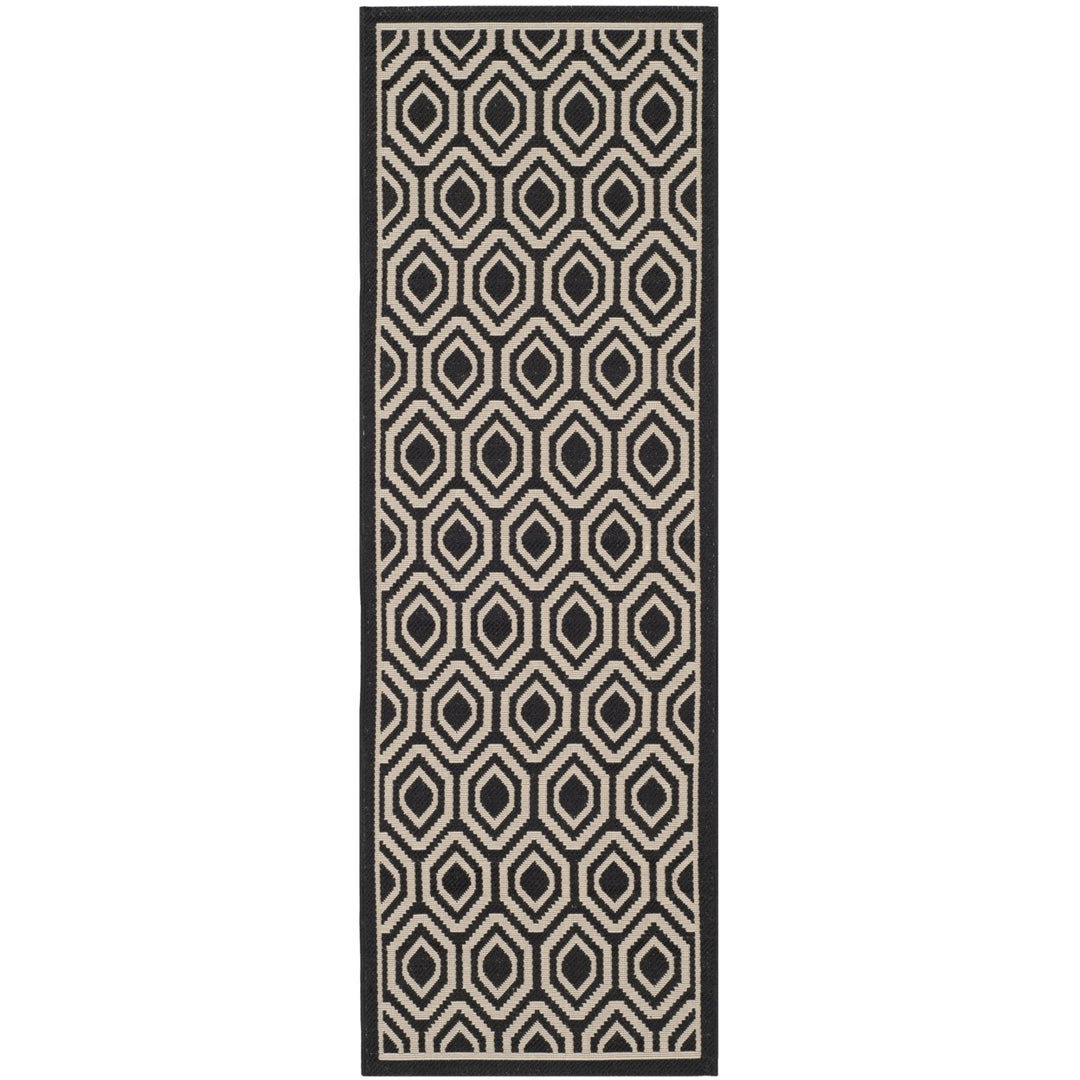 SAFAVIEH Indoor Outdoor CY6902-266 Courtyard Black / Beige Rug Image 1