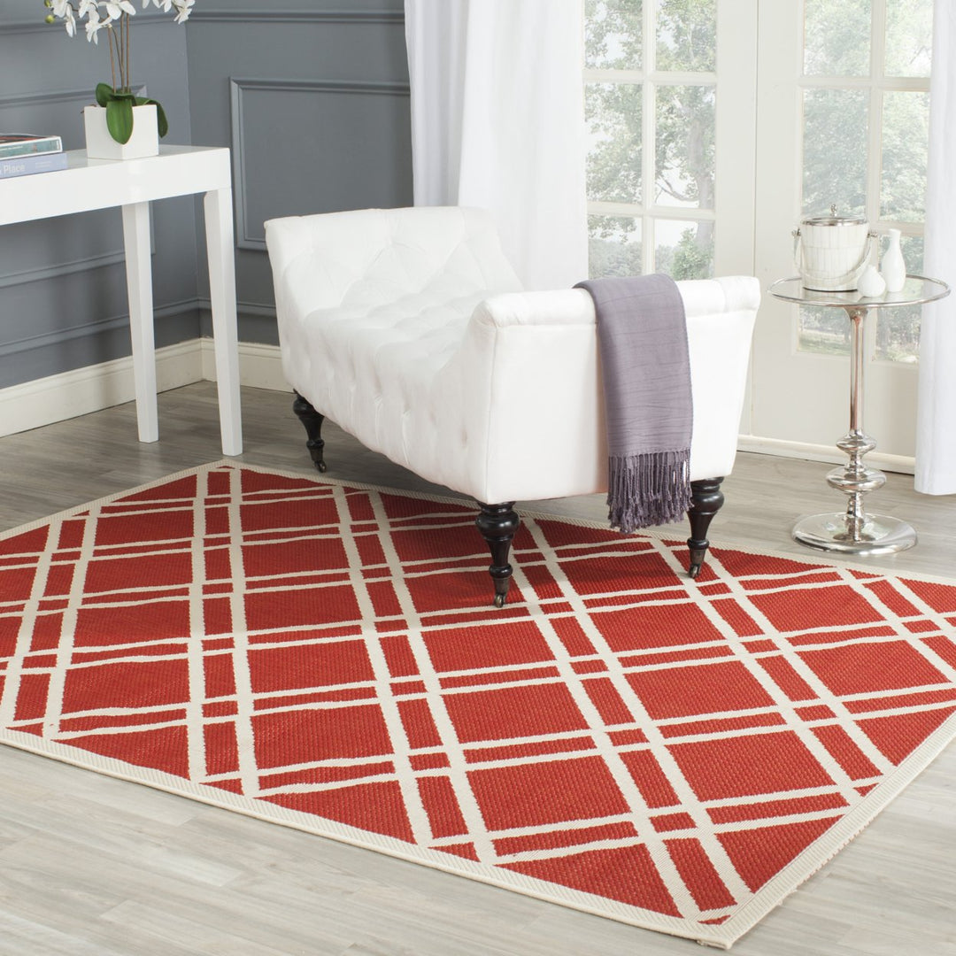 SAFAVIEH Outdoor CY6923-248 Courtyard Collection Red / Bone Rug Image 1