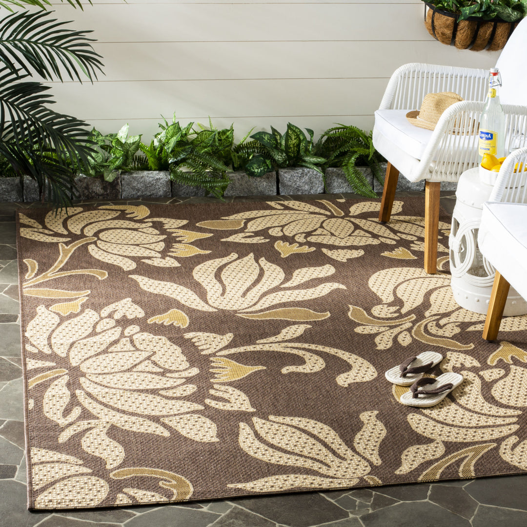 SAFAVIEH Outdoor CY7013-229A21 Courtyard Lt Chocolate / Cream Rug Image 1