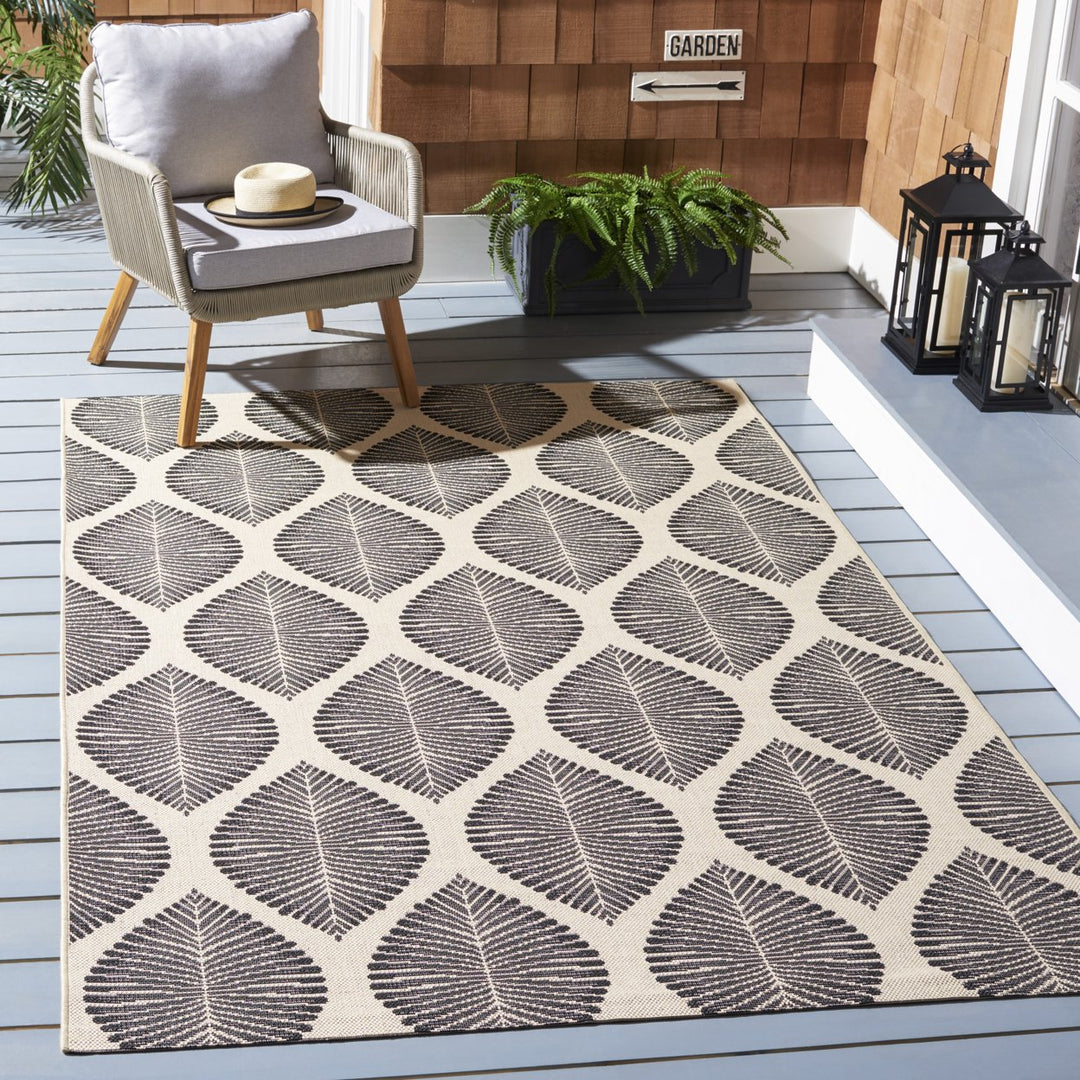 SAFAVIEH Outdoor CY7504-25612 Courtyard Black / Ivory Rug Image 1