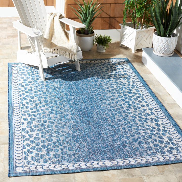 SAFAVIEH Outdoor CY8100-53412 Courtyard Blue / Ivory Rug Image 1