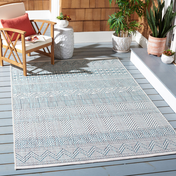 SAFAVIEH Outdoor CY8196-53512 Courtyard Ivory / Turquoise Rug Image 1