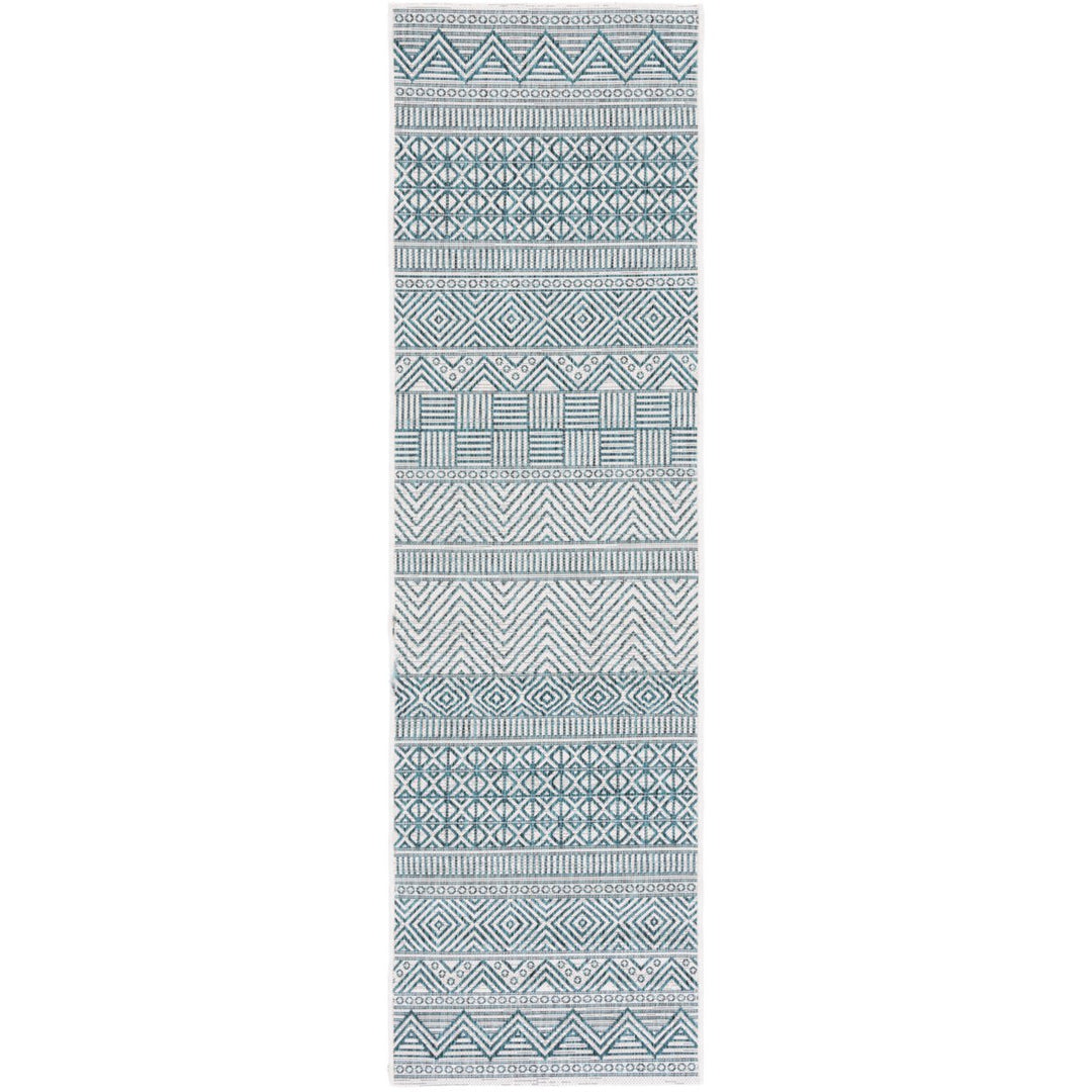 SAFAVIEH Outdoor CY8196-53512 Courtyard Ivory / Turquoise Rug Image 1