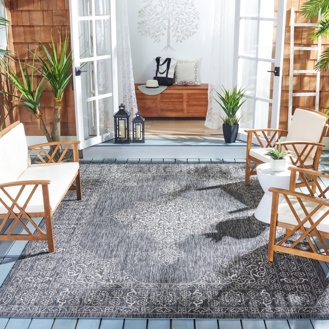 SAFAVIEH Outdoor CY8232-36621 Courtyard Black / Ivory Rug Image 1