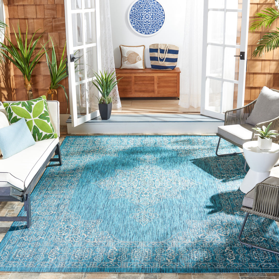 SAFAVIEH Outdoor CY8232-37221 Courtyard Teal / Ivory Rug Image 1