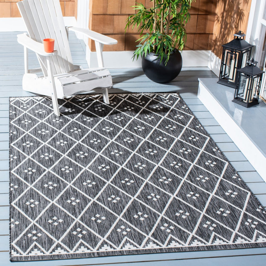 SAFAVIEH Indoor Outdoor CY8303-537 Courtyard Black / Ivory Rug Image 1