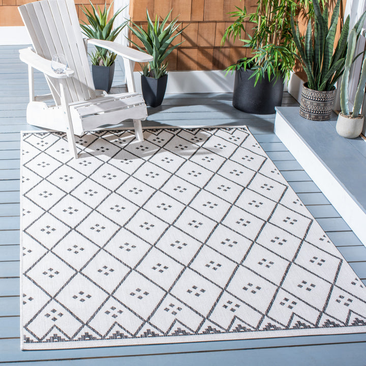 SAFAVIEH Indoor Outdoor CY8303-536 Courtyard Ivory / Black Rug Image 1