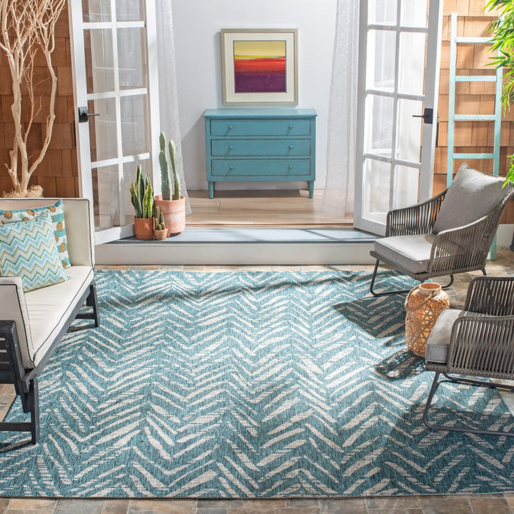 SAFAVIEH Outdoor CY8387-37221 Courtyard Blue / Grey Rug Image 1