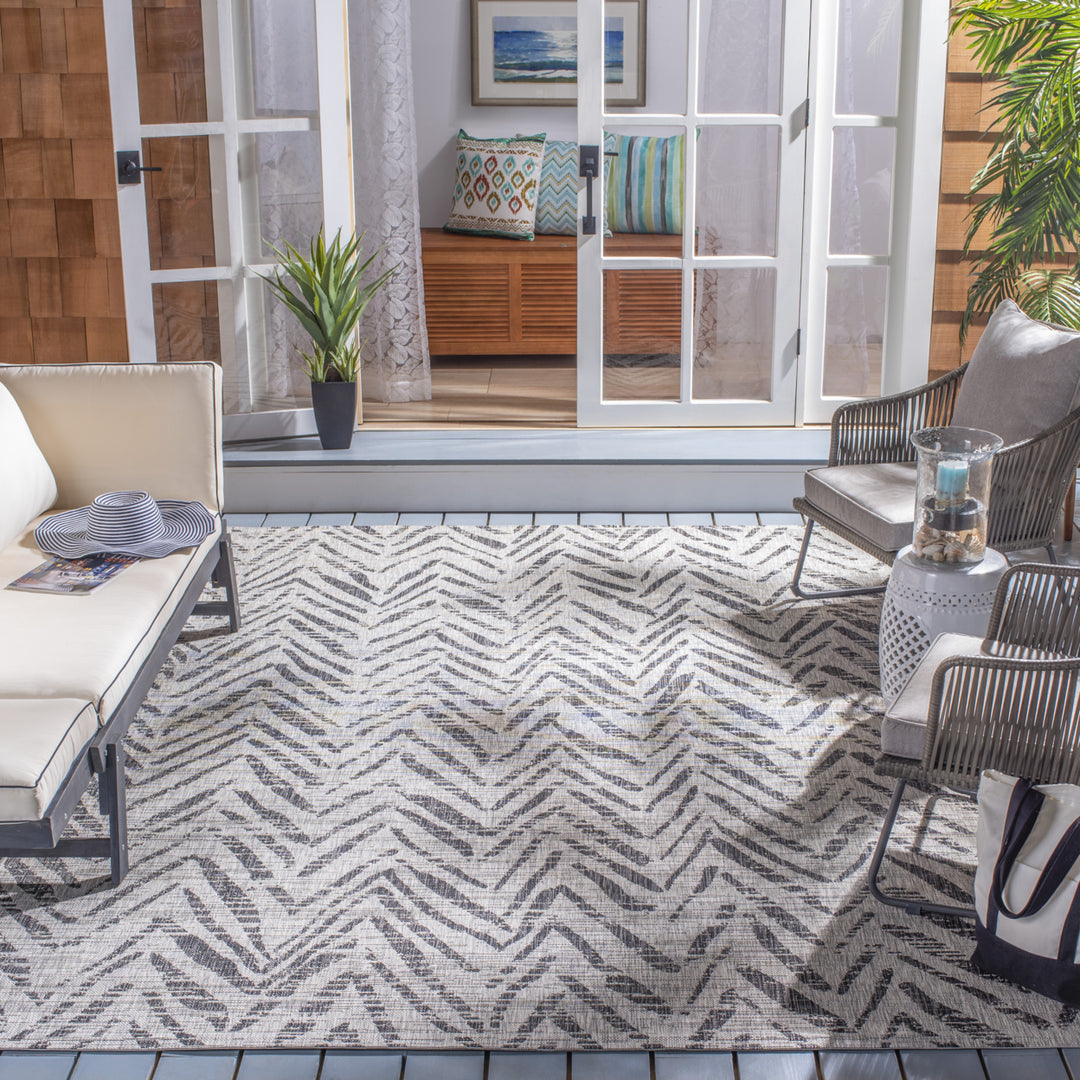 SAFAVIEH Outdoor CY8387-37612 Courtyard Grey / Black Rug Image 1