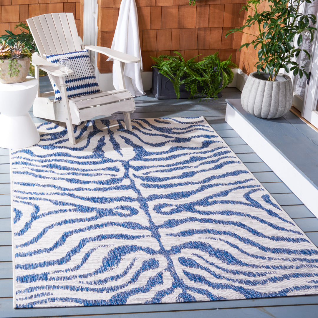 SAFAVIEH Outdoor CY8444-53412 Courtyard Ivory / Navy Rug Image 1