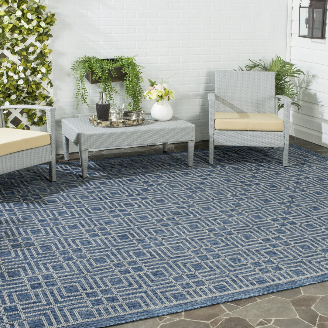 SAFAVIEH Outdoor CY8467-36821 Courtyard Navy / Grey Rug Image 1