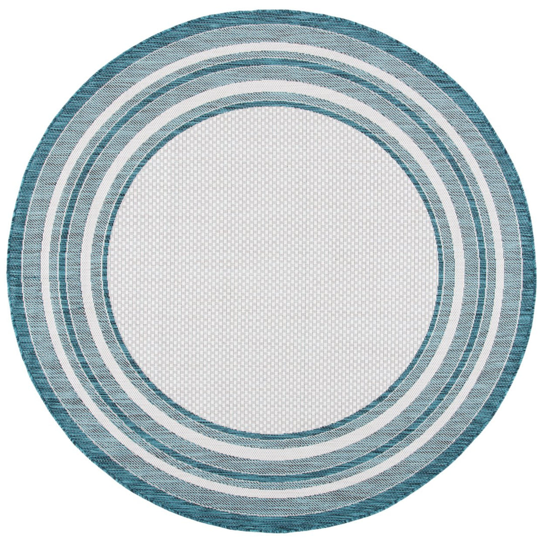 SAFAVIEH CY8475-53512 Courtyard Ivory / Teal Image 1