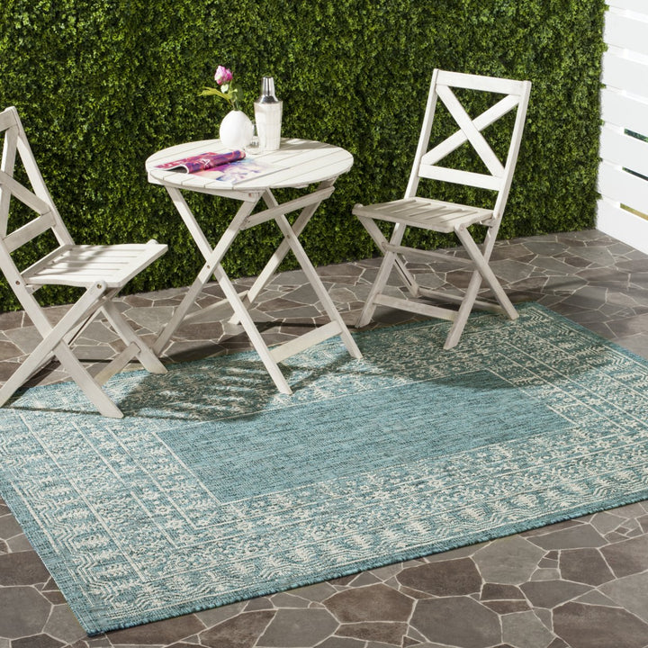 SAFAVIEH Outdoor CY8482-37221 Courtyard Blue / Grey Rug Image 1