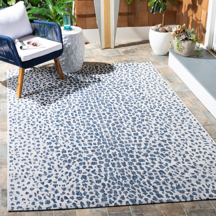 SAFAVIEH Outdoor CY8505-53412 Courtyard Ivory / Navy Rug Image 1