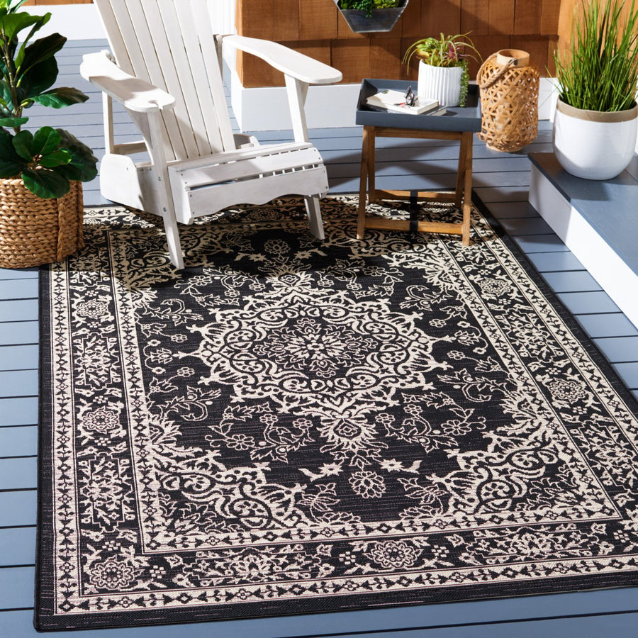 SAFAVIEH Outdoor CY8679-25621 Courtyard Black / Ivory Rug Image 1