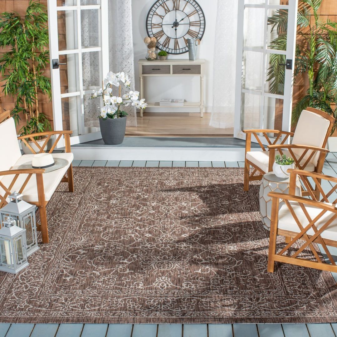 SAFAVIEH Outdoor CY8680-36321 Courtyard Brown / Ivory Rug Image 1