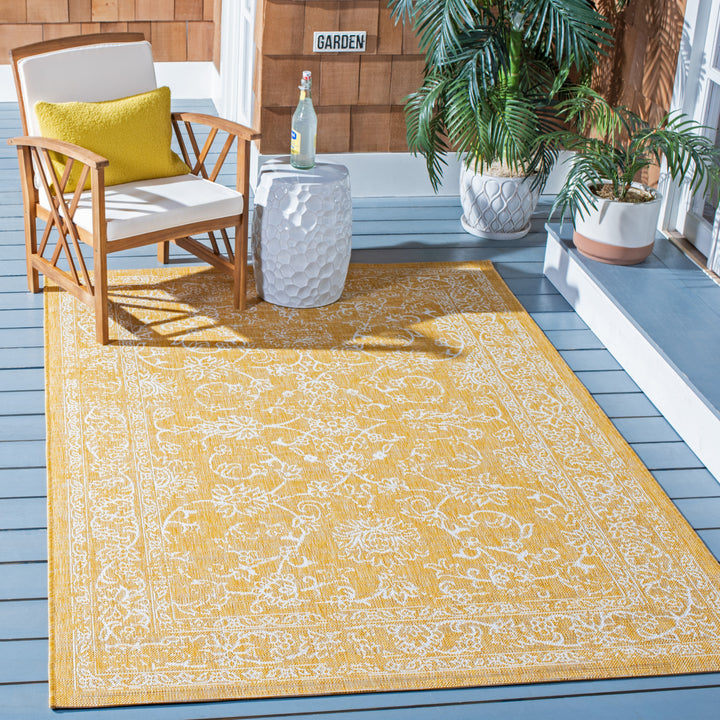 SAFAVIEH Outdoor CY8680-56021 Courtyard Gold / Ivory Rug Image 1