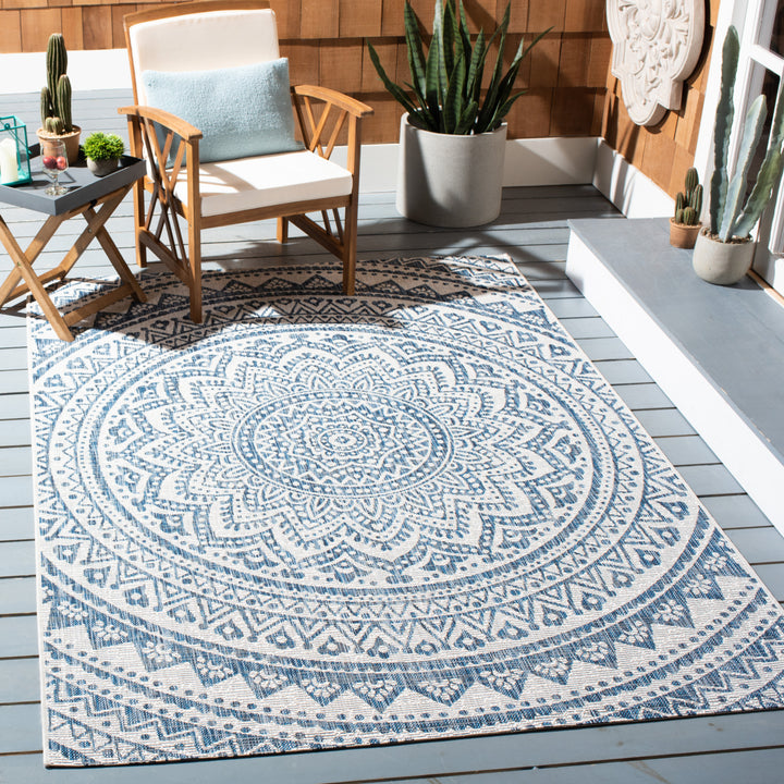 SAFAVIEH Outdoor CY8734-53412 Courtyard Ivory / Navy Rug Image 1