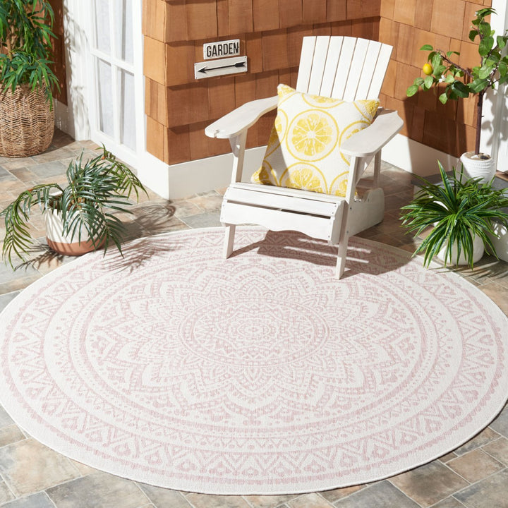 SAFAVIEH Outdoor CY8734-56212 Courtyard Ivory / Soft Pink Rug Image 2