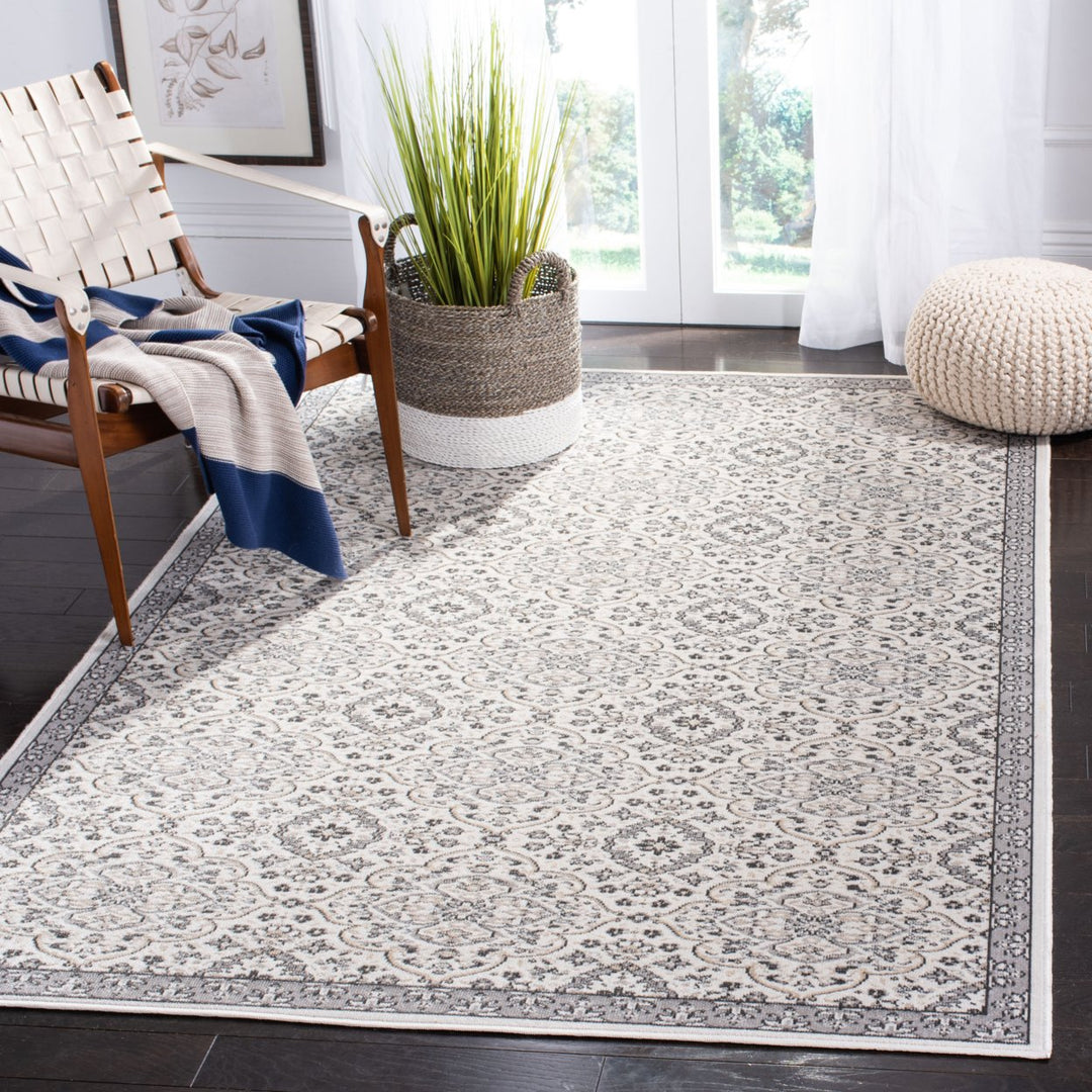 SAFAVIEH Outdoor MTG283A Montage Collection Ivory / Grey Rug Image 1