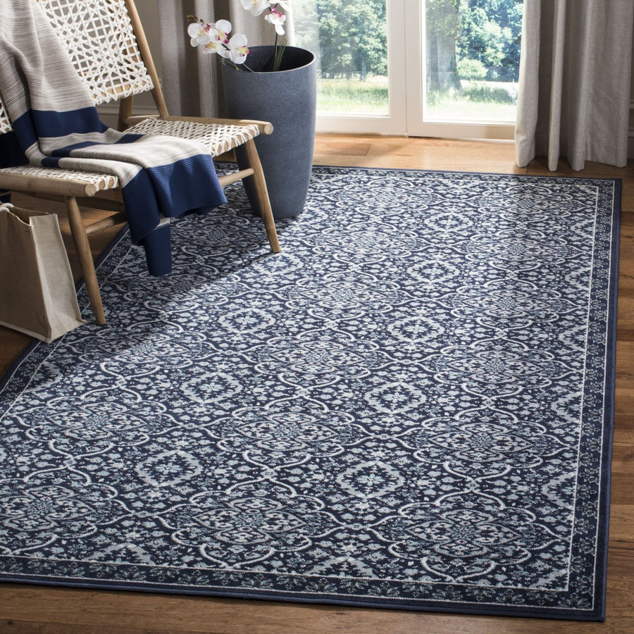 SAFAVIEH Outdoor MTG283N Montage Collection Navy / Ivory Rug Image 1