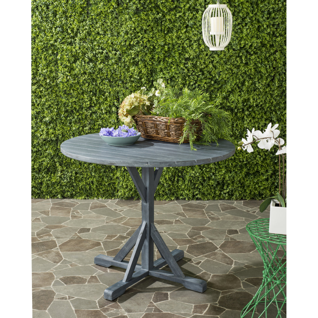 SAFAVIEH Outdoor Collection Arcata Round Table Ash Grey Image 1